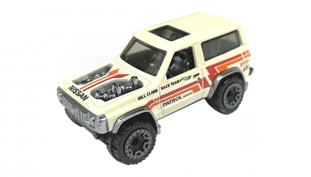 Машинка Базова Hot Wheels Nissan Patrol Custom J-Imports 1:64 HKG23 Tan - Retromagaz, image 2