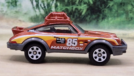 Тематическая Машинка Matchbox 1985 Porsche 911 Rally Germany 1:64 GWL49/HPC58 Brown - Retromagaz, image 4