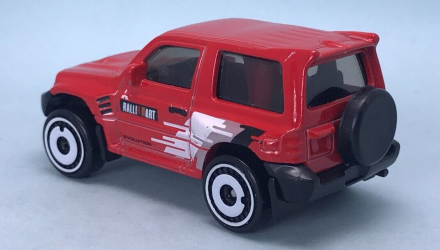 Машинка Базова Hot Wheels Mitsubishi Pajero Evolution Mud Studs 1:64 HKG47 Red - Retromagaz, image 3