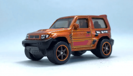 Машинка Базовая Hot Wheels Mitsubishi Pajero Evolution Super Treasure Hunt STH J-Imports 1:64 HTF38 Orange - Retromagaz, image 1