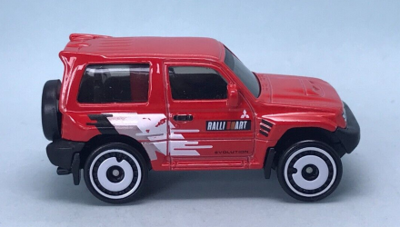 Машинка Базова Hot Wheels Mitsubishi Pajero Evolution Mud Studs 1:64 HKG47 Red - Retromagaz, image 4