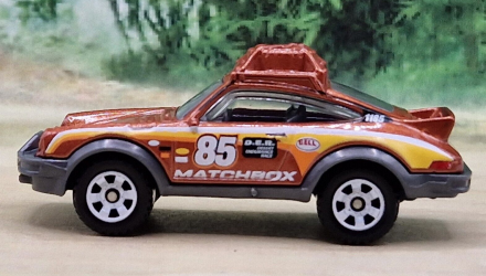 Тематическая Машинка Matchbox 1985 Porsche 911 Rally Germany 1:64 GWL49/HPC58 Brown - Retromagaz, image 5