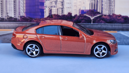 Машинка Велике Місто Matchbox Holden VF Commodore SSV Highway 1:64 HVN64 Orange - Retromagaz, image 2