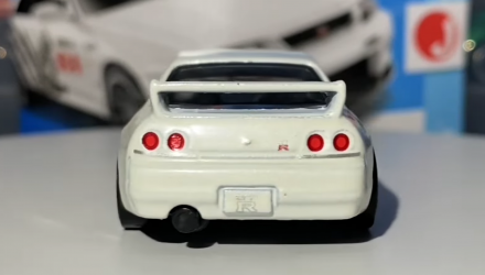 Машинка Базовая Hot Wheels Nissan Skyline GT-R R33 Godzilla J-Imports 1:64 HTC44 White - Retromagaz, image 6